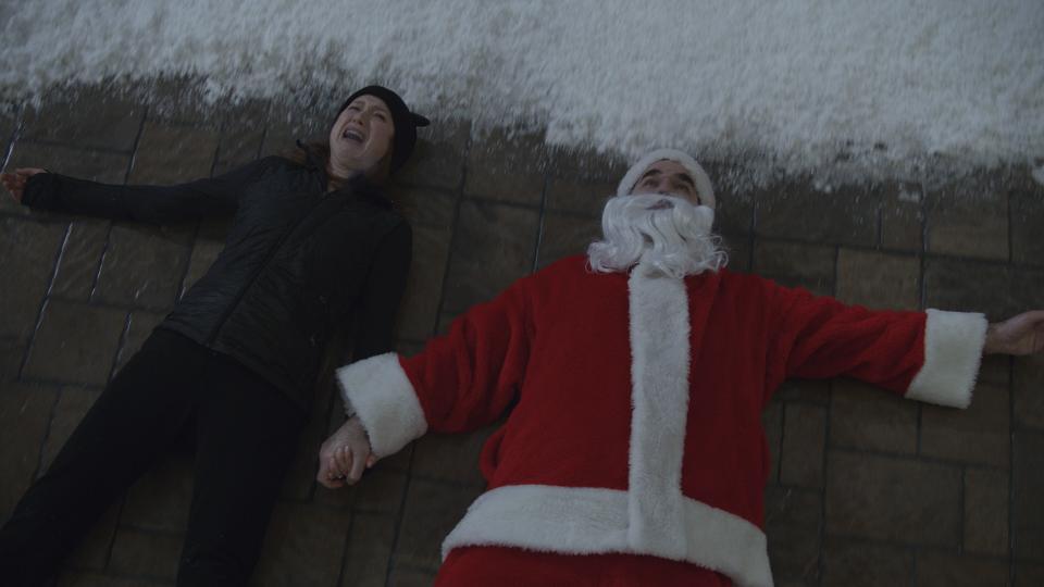 Ellie Kemper and Rob Delaney take many stumbles throughout 'Home Sweet Home Alone'. (20th Century Studios/Disney+)