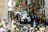 Pope Francis greets faithfuls as he travels in the popemobile through Cartagena, Colombia, September 10, 2017. REUTERS/Federico Rios