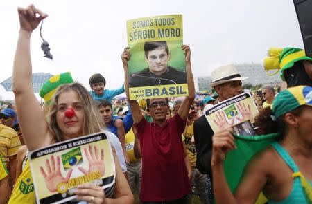 People attend a protest against corruption in front of the National Congress in Brasilia, Brazil December 4, 2016. The sign reads: "We are Sergio Moro" in reference to federal judge Sergio Moro. REUTERS/Adriano Machado