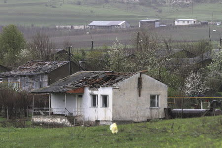 A house which was damaged during clashes between Armenian and Azeri forces, is seen in the town of Martakert in Nagorno-Karabakh region, which is controlled by separatist Armenians, April 3, 2016. REUTERS/Vahram Baghdasaryan/Photolure