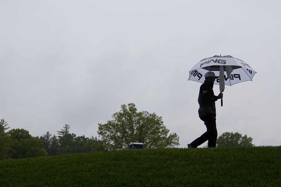 Corey Conners, of Canada, walks on the fourth hole during the third round of the PGA Championship golf tournament at Oak Hill Country Club on Saturday, May 20, 2023, in Pittsford, N.Y. (AP Photo/Eric Gay)