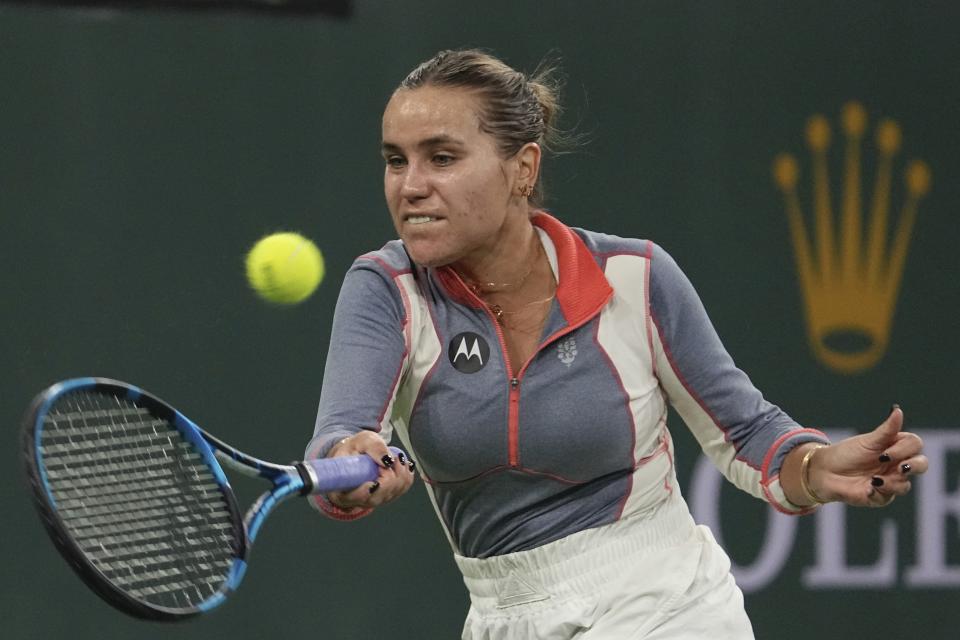 Sofia Kenin returns a shot to Sloane Stephens at the BNP Paribas Open tennis tournament Thursday, March 9, 2023, in Indian Wells, Calif. (AP Photo/Mark J. Terrill)