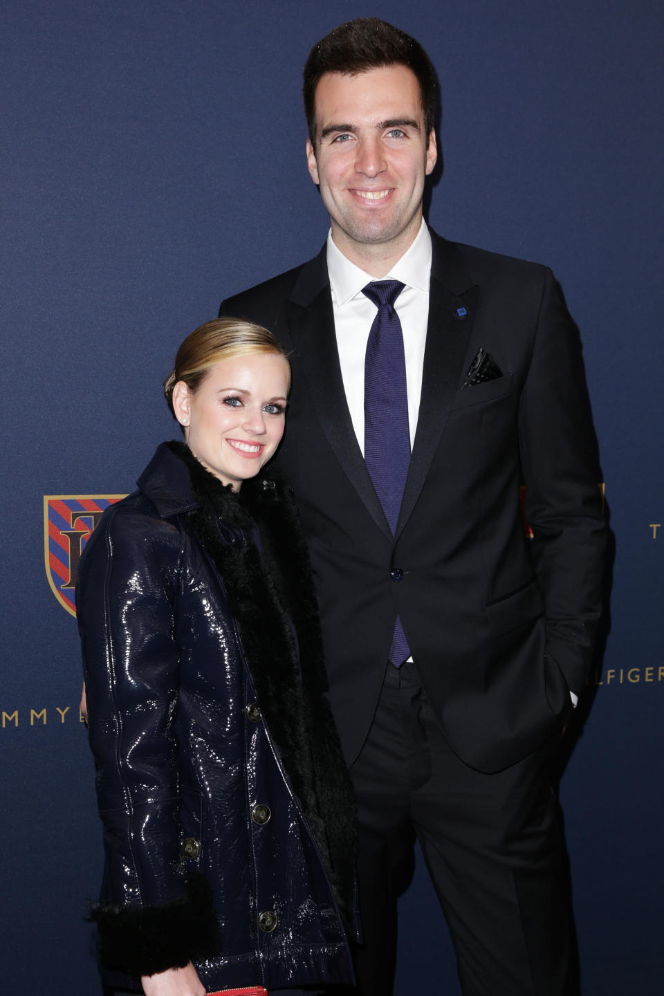 This image released by Starpix shows Baltimore Ravens quarterback Joe Flacco, right, and his wife Dana Grady at the Tommy Hilfiger Men's Fall 2013 collection, Friday, Feb. 8, 2013 during Fashion Week in New York. (AP Photo/Starpix, Andrew Toth)