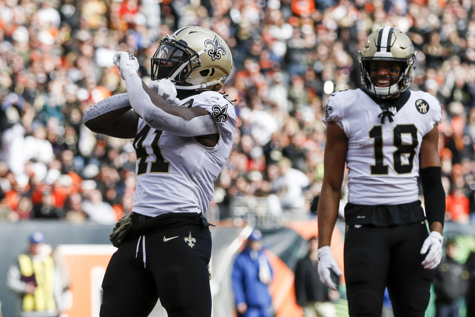 New Orleans Saints running back Alvin Kamara (41) reacts after scoring a touchdown in the first half of an NFL football game against the Cincinnati Bengals, Sunday, Nov. 11, 2018, in Cincinnati. (AP Photo/Frank Victores)