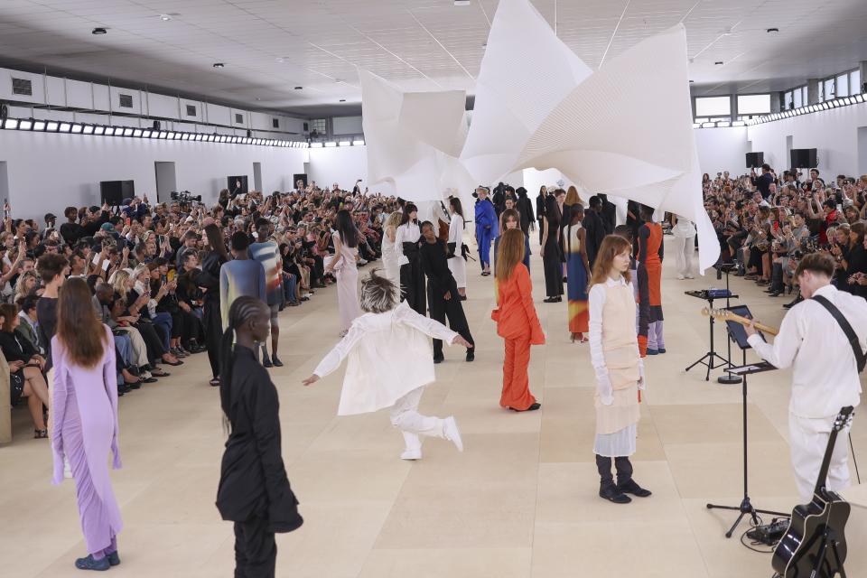 Models wear creations for the Issey Miyake Spring/Summer 2024 womenswear fashion collection presented Friday, Sept. 29, 2023 in Paris. (AP Photo/Vianney Le Caer)