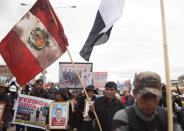 Relatives mourn victims one month after the deadliest clashes in anti-government protests against Peru's President Dina Boluarte, in Juliaca