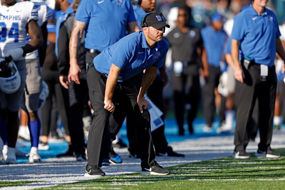 Memphis head coach Ryan Silverfield watches a play from the sideline during the second half of an NCAA college football game against Tulane in New Orleans, Saturday, Oct. 22, 2022. Tulane won 38-28. (AP Photo/Tyler Kaufman)