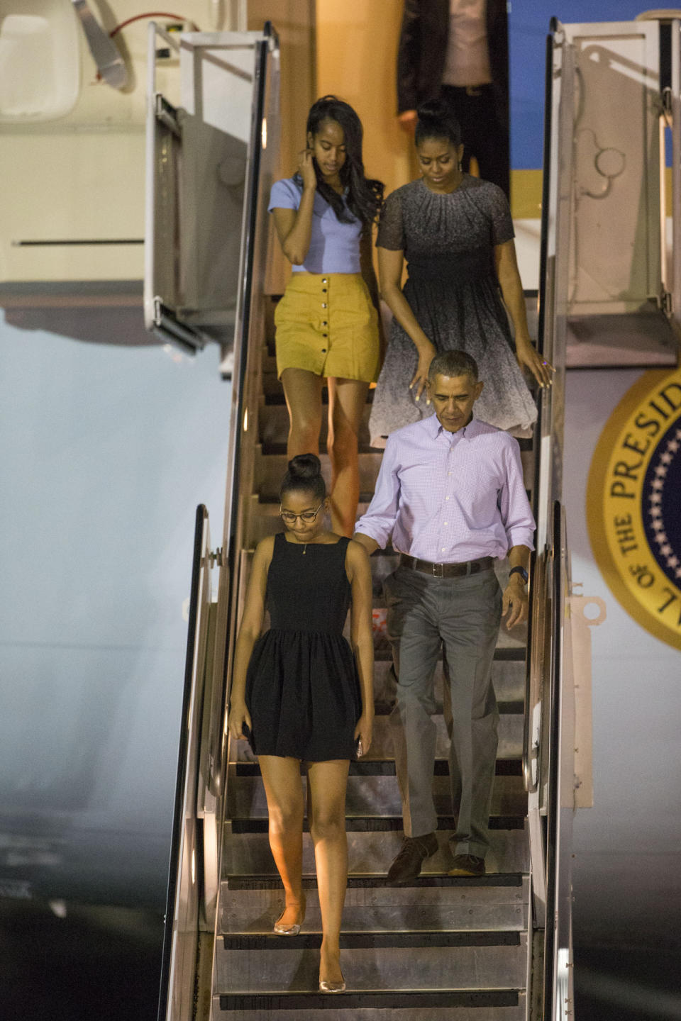 President Barack Obama arriving in Honolulu, Hawaii for the family’s annual vacation with daughters Sash and Malia, and first lady Michelle Obama. 