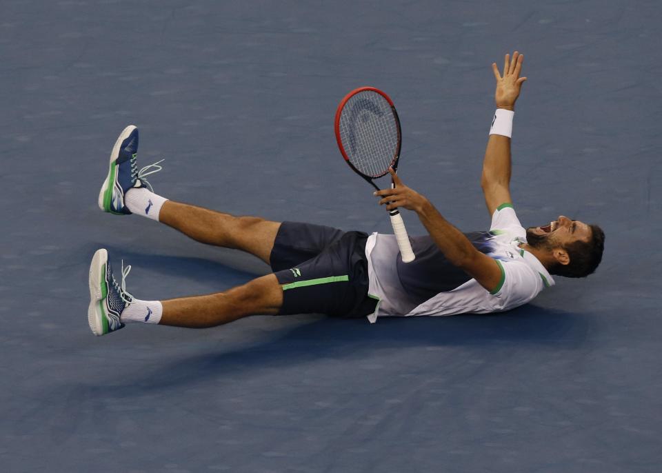 Marin Cilic of Croatia celebrates after defeating Kei Nishikori of Japan in their men's singles final match at the 2014 U.S. Open tennis tournament in New York, in this September 8, 2014 file photo. REUTERS/Shannon Stapleton/Files (UNITED STATES - Tags: SPORT TENNIS TPX IMAGES OF THE DAY)