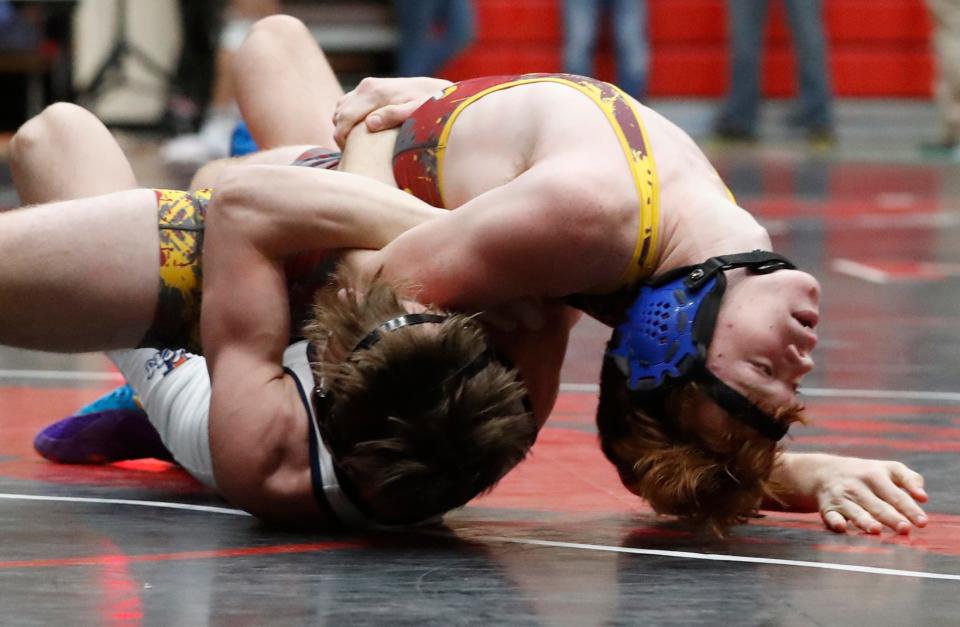 Faith Christian Ethan Seubring wrestles Harrison Tiernen Tuttle during the IHSAA wrestling sectionals meet, Saturday, Jan. 27, 2024, at Lafayette Jeff High School in Lafayette, Ind.