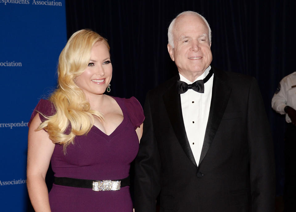 FILE - In this May 3, 2014 file photo, Meghan McCain, and Sen. John McCain attend the White House Correspondents' Association Dinner in Washington. Meghan McCain says President Donald Trump's life is “pathetic” after his Twitter attack against her father, the late Sen. McCain. She fired back Monday, March 18, 2019, at Trump on “The View” after the president tweeted comments over the weekend criticizing her father, who died last year after battling brain cancer. (Photo by Evan Agostini/Invision/AP, File)