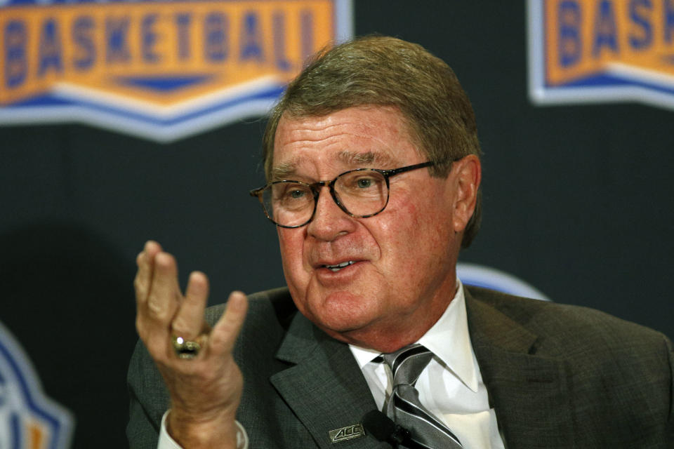 Atlantic Coast Conference commissioner John Swofford listens to a question at a press conference during the ACC NCAA college basketball media day in Charlotte, N.C., Tuesday, Oct. 8, 2019. (AP Photo/Nell Redmond)