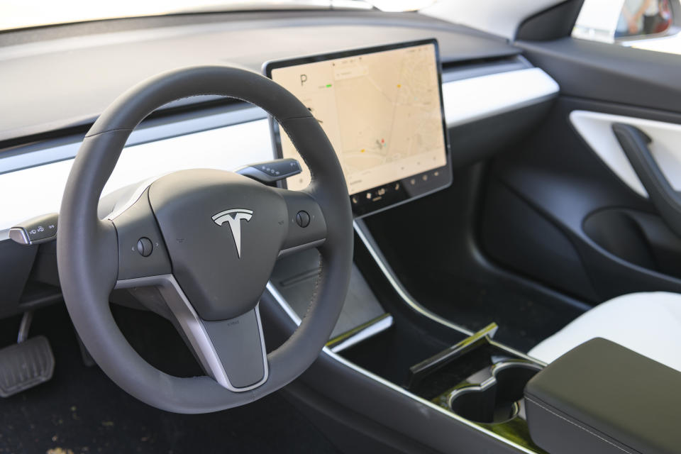 BAARN, NETHERLANDS - AUGUST 25: Tesla Model 3 compact full electric car interior with a large touch screen on the dahsboard on display at the 2019 Concours d'Elegance at palace Soestdijk on August 25, 2019 in Baarn, Netherlands. This is the first time the Concours d'Elegance will be held at Soestdijk Palace and the 2019 edition was held on 24-25 August. (Photo by Sjoerd van der Wal/Getty Images)