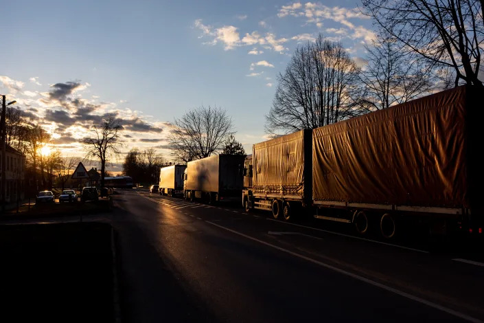 Trucks stand in line while on route towards the border crossing point on April 16, 2022 in Kybartai, Lithuania.