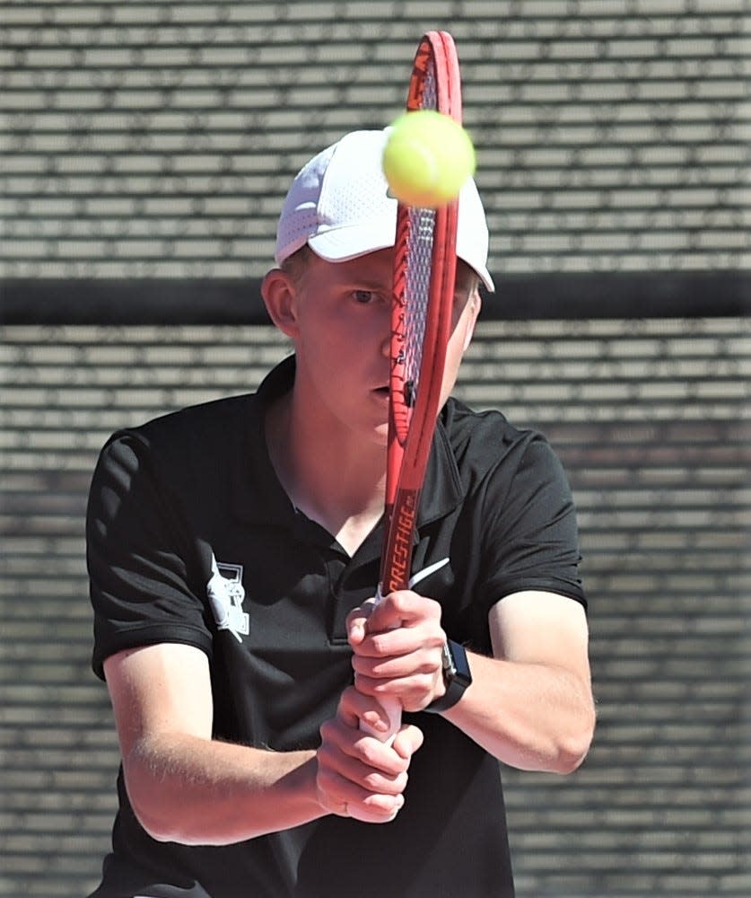 Abilene High's Griffin Sullivan eyes the ball during his boys singles playback match against Wylie's Brandon Cowling at the Region I-5A tournament Tuesday. April 11, 2023, in Lubbock. Sullivan won 6-3, 6-3 to earn his state berth.