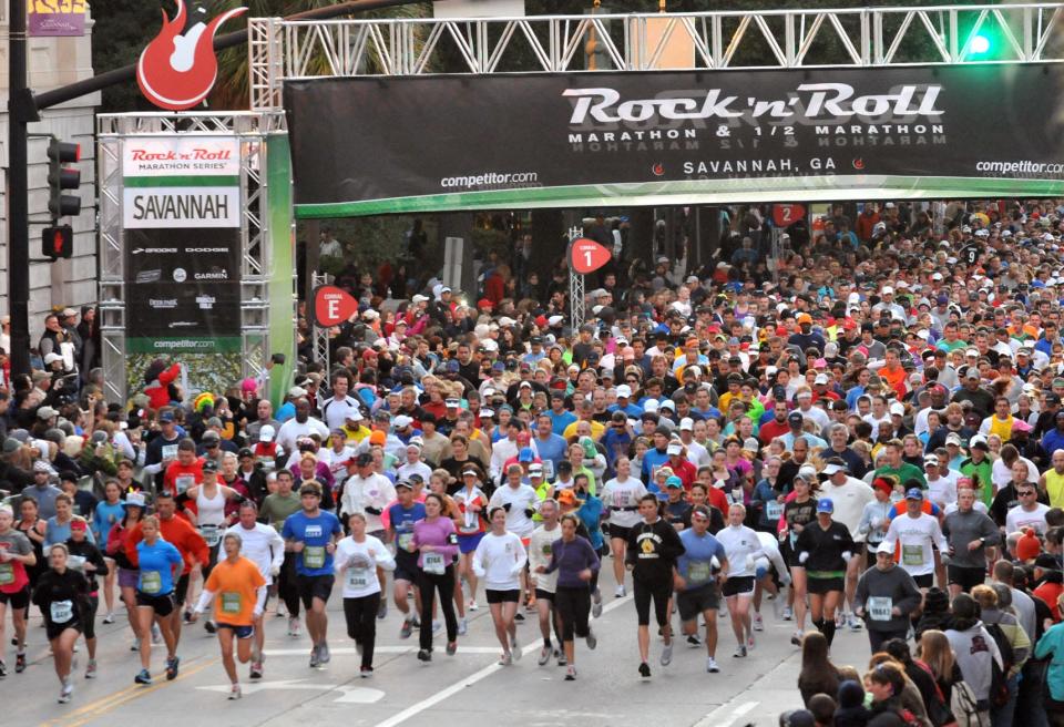 A wave of runners leaves the starting line during the Rock 'n' Roll Savannah Marathon Saturday November 5, 2011.