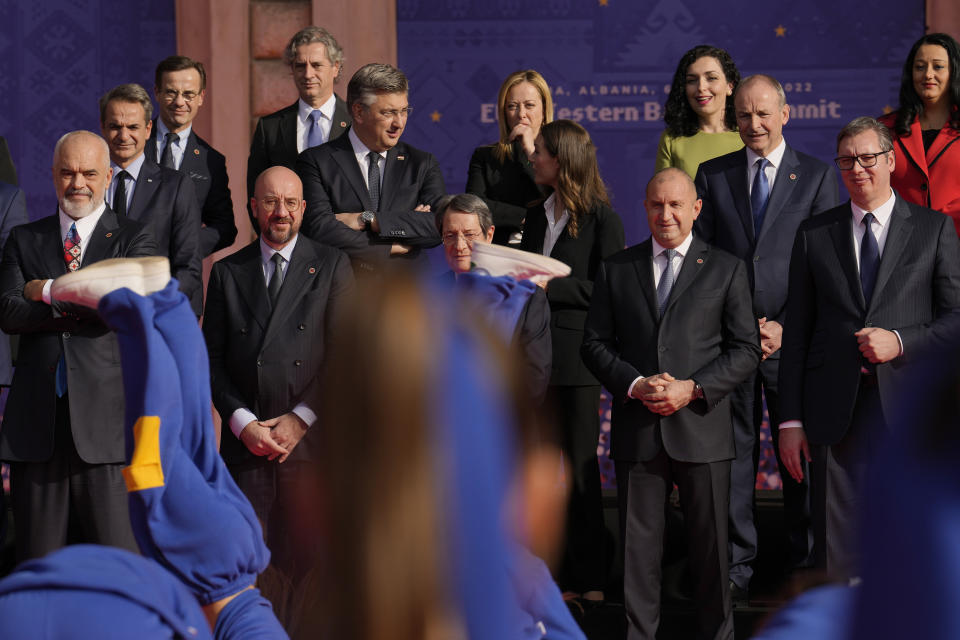 European Union and Western Balkan leaders watch a dance performance during the EU-Western Balkans Summit, in Tirana, Albania, Tuesday, Dec. 6, 2022. EU leaders and their Western Balkans counterparts gathered Tuesday for talks aimed at boosting their partnership as Russia's war in Ukraine threatens to reshape the geopolitical balance in the region. (AP Photo/Vadim Ghirda)