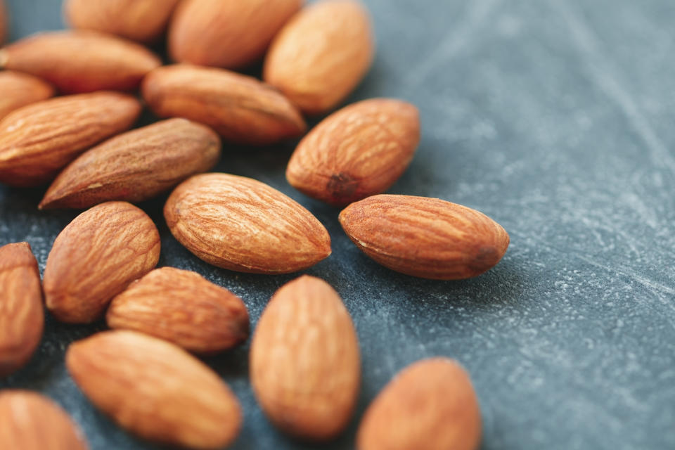 Almonds have omega-3 fats and fiber to help lift our spirits. (Photo: Getty Images)