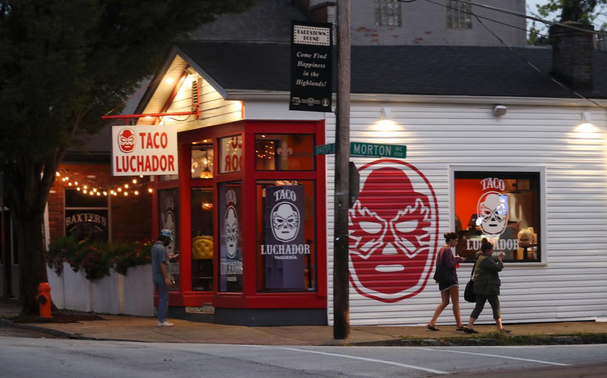 Patrons leave the Taco Luchador on Baxter Ave. just south of Broadway in Louisville, Ky. on Sep. 20, 2021.  There is a proposal to close off this stretch of road to vehicles on the weekend.