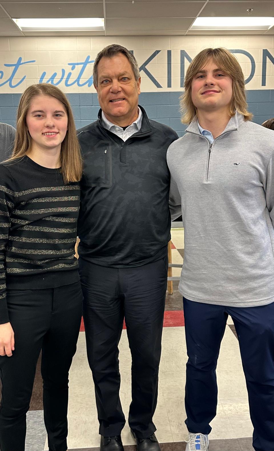 Greg Matthews poses with grandchildren Alexa and Brady Langager. Matthews will celebrate his birthday on Feb. 29.