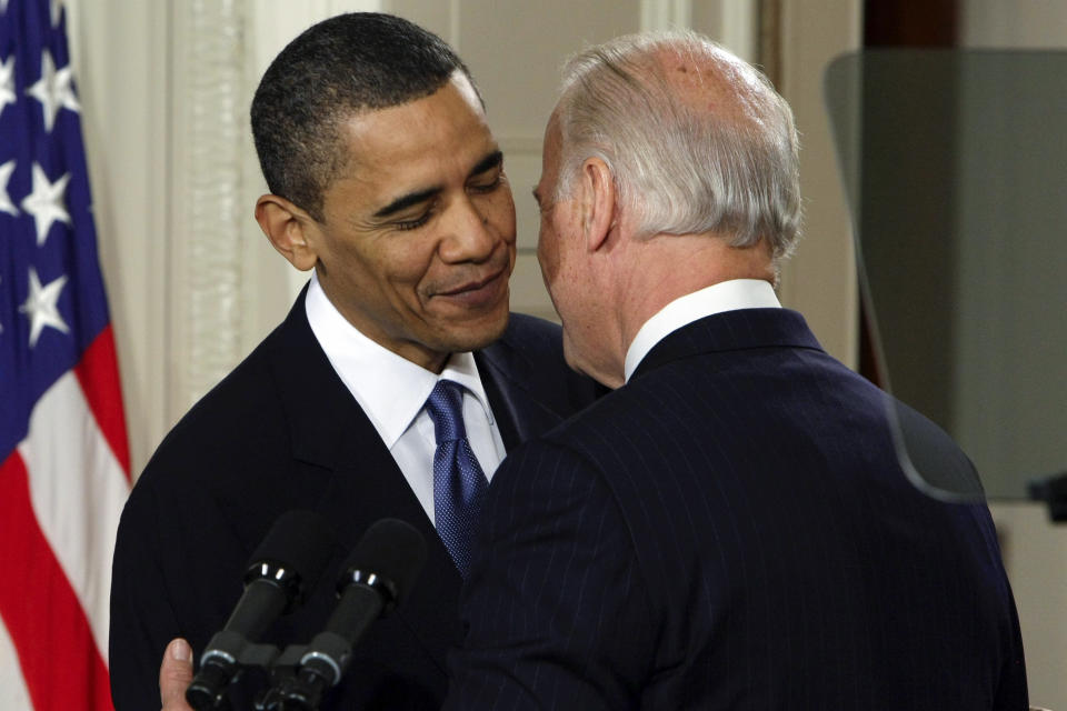 FILE - Vice President Joe Biden whispers "This is a big f------ deal," to President Barack Obama after introducing Obama during the health care bill ceremony in the East Room of the White House in Washington, March 23, 2010. President Joe Biden will share a stage with Barack Obama and Bill Clinton in New York as he raises money for his reelection campaign. Thursday's event is a one-of-a-kind political extravaganza that will showcase decades of Democratic leadership. (AP Photo/J. Scott Applewhite, File)