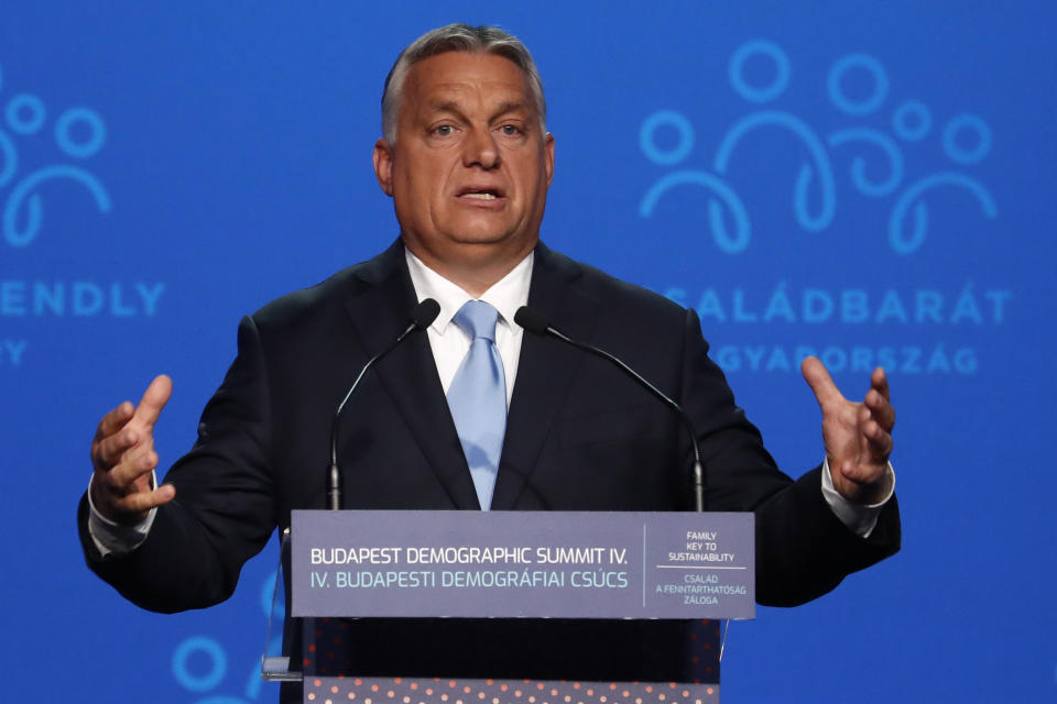 Hungary's Prime Minister Viktor Orban holds a speech during the 4th Budapest Demographic Summit in Budapest, Hungary, Thursday, Sept. 23, 2021. The biannual demographic summit, which was first organized in 2015, offers a forum for "pro-family thinker" decision-makers, scientists, researchers, and church representatives of the same sort to exchange their thoughts about connections between demographics and sustainability. (AP Photo/Laszlo Balogh)