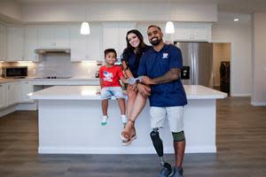 Marine Corporal Darryl Charles and his family received their specially adapted custom home from Homes For Our Troops this past September.