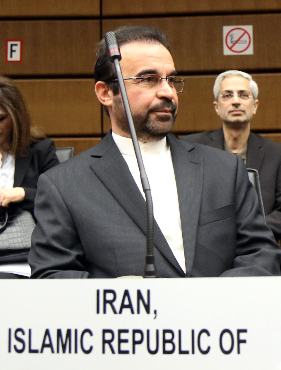 Iran's Ambassador to the International Atomic Energy Agency, IAEA, Reza Najafi waits for the start of the IAEA board of governors meeting at the International Center in Vienna, Austria, Monday, March 3, 2014. (AP Photo/Ronald Zak)