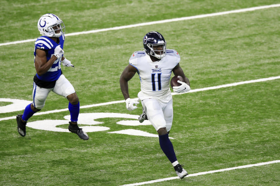 INDIANAPOLIS, INDIANA - NOVEMBER 29: A.J. Brown #11 of the Tennessee Titans carries the ball for a touchdown following a catch in the first quarter during their game against the Indianapolis Colts at Lucas Oil Stadium on November 29, 2020 in Indianapolis, Indiana. (Photo by Andy Lyons/Getty Images)