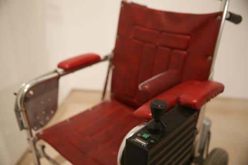 The scientist used this red leather wheelchair from the late 1980s to the mid-1990s, driving himself with the help of a joystick