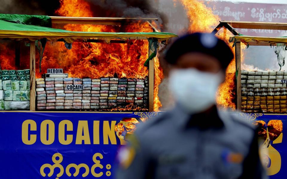 Myanmar authorities ceremonially burned 25 kinds of seized narcotic drugs in Yangon  - Credit: Imago / Barcroft Images