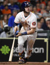 Houston Astros' Kyle Tucker watches his two-run home run during the seventh inning of a baseball game against the Texas Rangers, Saturday, May 15, 2021, in Houston. (AP Photo/Eric Christian Smith)