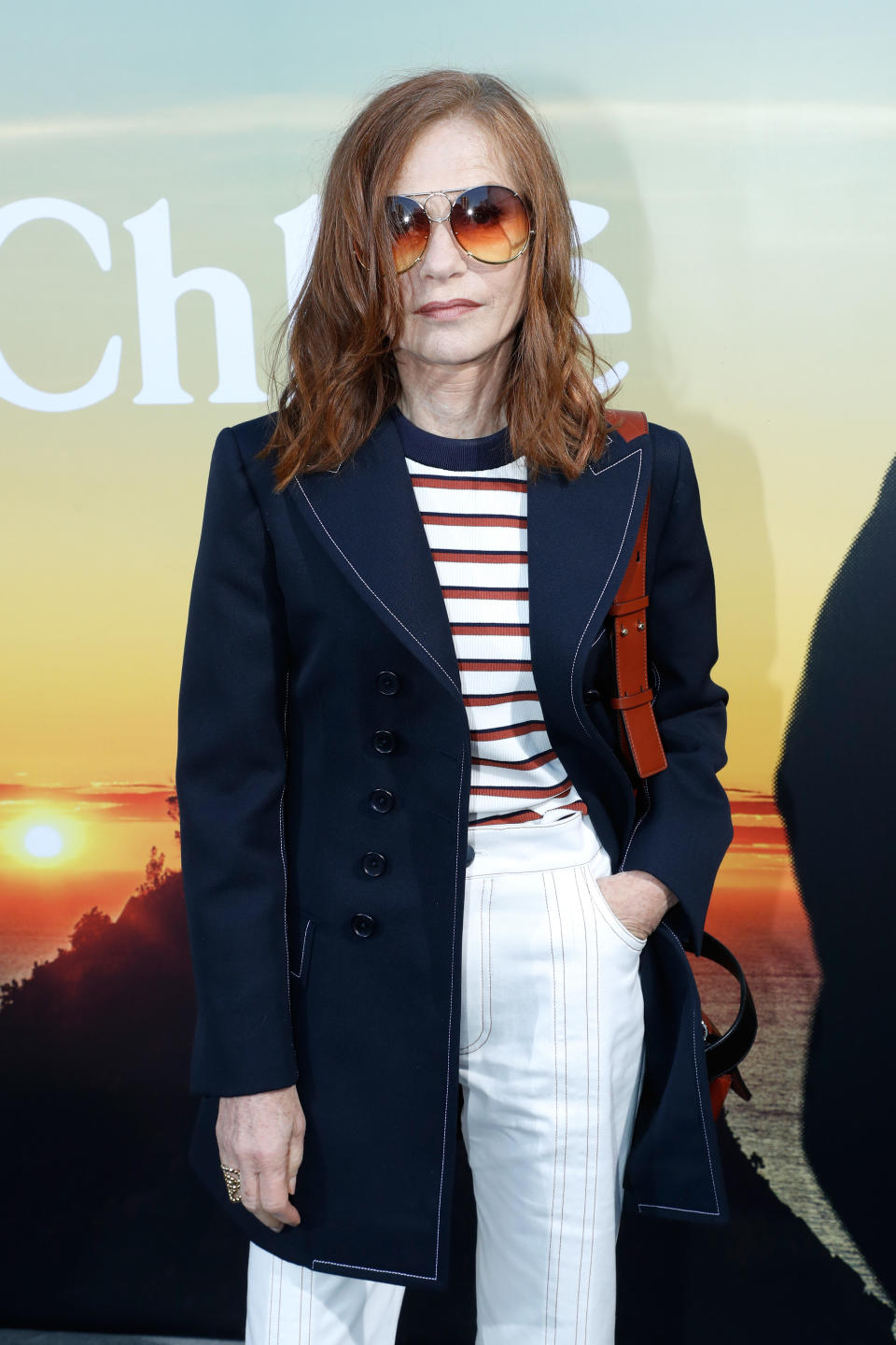 <p>Tout en discrétion et en classe, l’actrice Isabelle Huppert était également présente au premier rang pour ne rien manquer des dernières créations de la marque. Crédit photo : Getty Images </p>