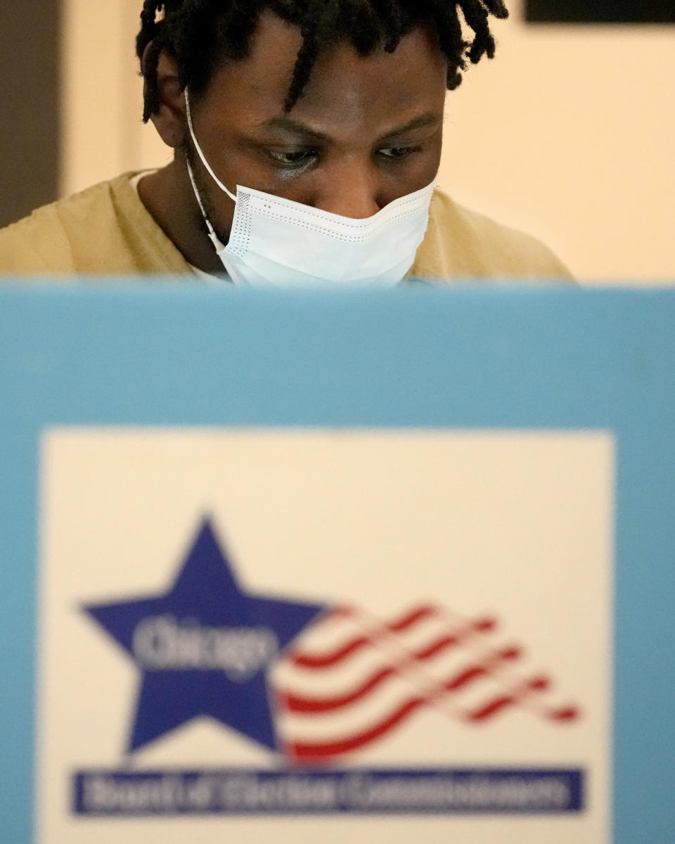 Tykarri Skillon, an inmate at the Cook County, Ill., jail votes in a local election at the jail's Division 11 Chapel on Saturday, Feb. 18, 2023, in Chicago. (AP Photo/Charles Rex Arbogast)