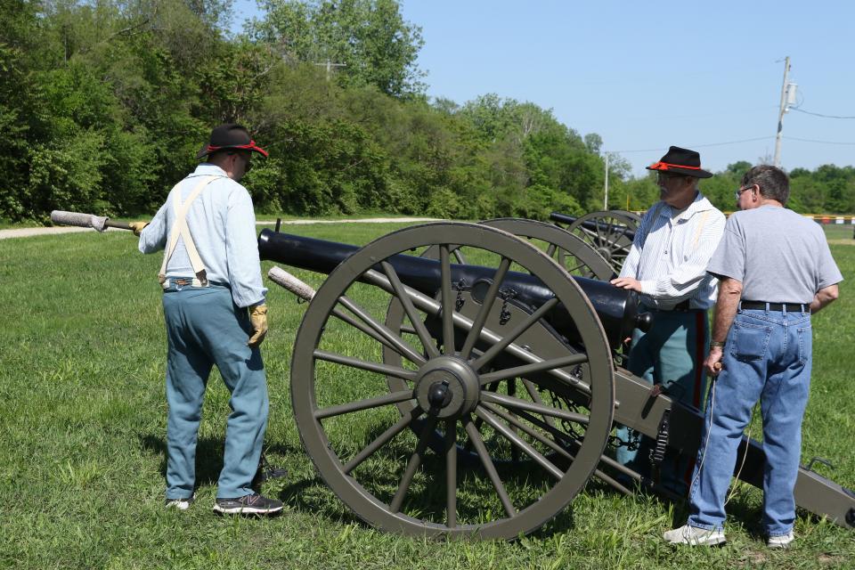 Members of the 5th Ohio volunteer light artillery group prepare to fire a Civil War era cannon. The 4th Annual Old Timey Days event was held Williams Park on May 18 and 19 in Gibsonburg.
