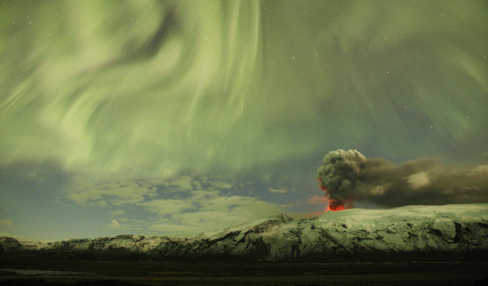 The Northern Lights are seen above the ash plume of Iceland’s Eyjafjallajokull volcano in the evening April 22, 2010. REUTERS/Lucas Jackson