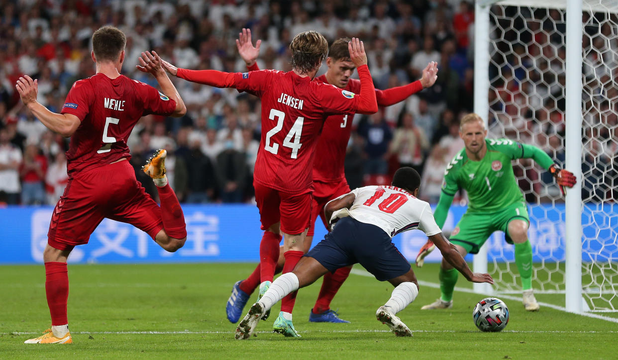 LONDON, ENGLAND - JULY 07: Raheem Sterling of England is fouled by Mathias Jensen of Denmark leading to a penalty being awarded during the UEFA Euro 2020 Championship Semi-final match between England and Denmark at Wembley Stadium on July 07, 2021 in London, England. (Photo by Alex Morton - UEFA/UEFA via Getty Images)