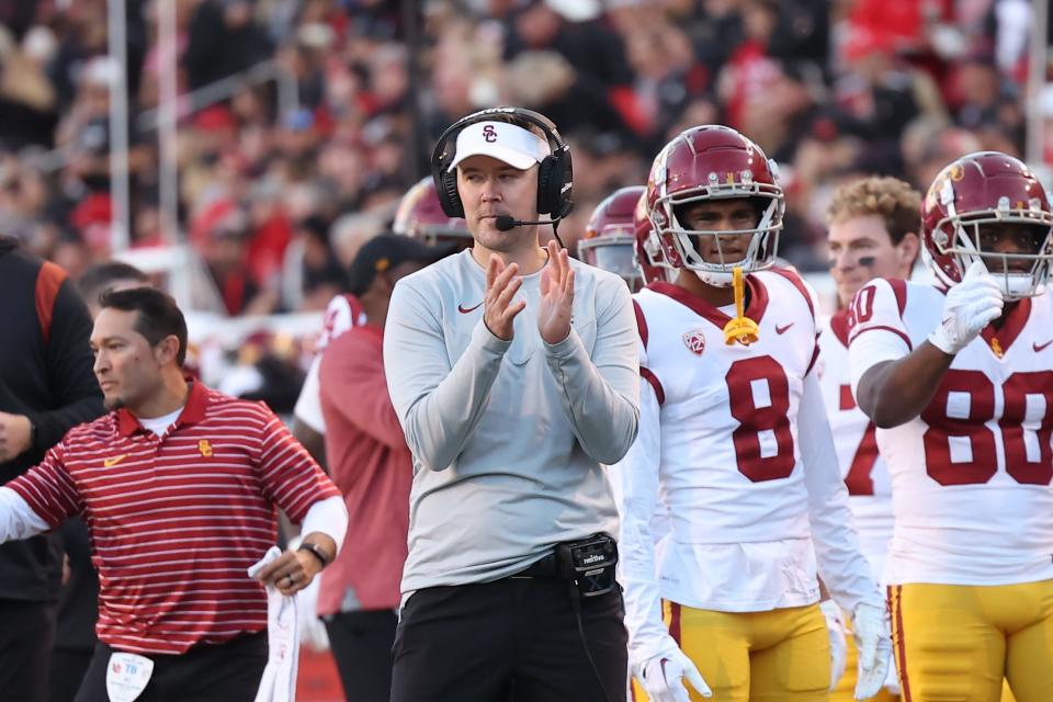 Southern California coach Lincoln Riley reacts after a touchdown against Utah during their 2022 game at Rice-Eccles Stadium.