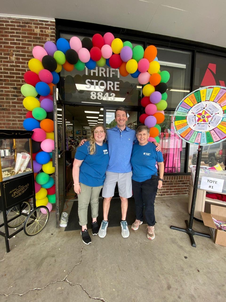 Shown during The Thrift Store’s recent first anniversary celebration are, from left, Megan McNeil, store manager; the Rev. Wil Cantrell, senior associate pastor; and Jane Currin, missions director.