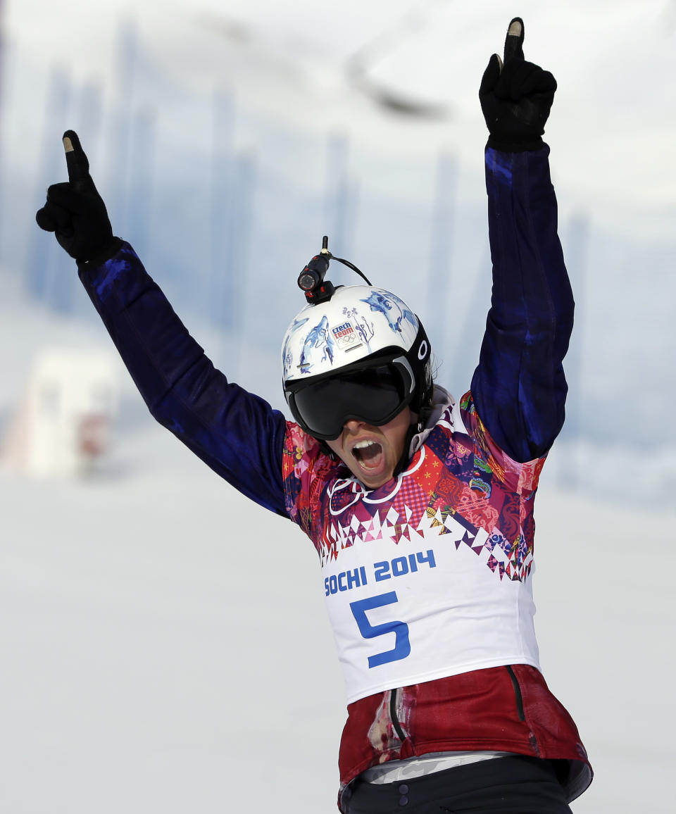 Czech Republic's Eva Samkova reacts after her seeding run during women's snowboard cross competition at the Rosa Khutor Extreme Park, at the 2014 Winter Olympics, Sunday, Feb. 16, 2014, in Krasnaya Polyana, Russia. (AP Photo/Andy Wong)