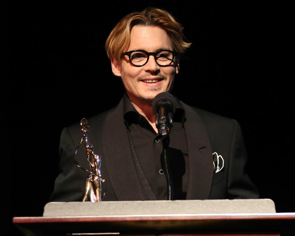 Romantic Johnny Depp 'Names Beach After Amber Heard'