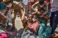 CPI and CPI(M) party workers being detained by the police during a protest against the farm bills, at Sub-Collector's Office in Vijayawada, Friday, Sept. 25, 2020. (PTI Photo)