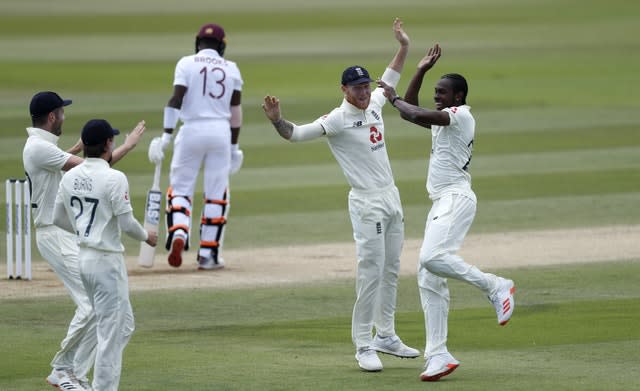 England’s Jofra Archer, right, celebrates taking the wicket of West Indies’ Shamarh Brooks 