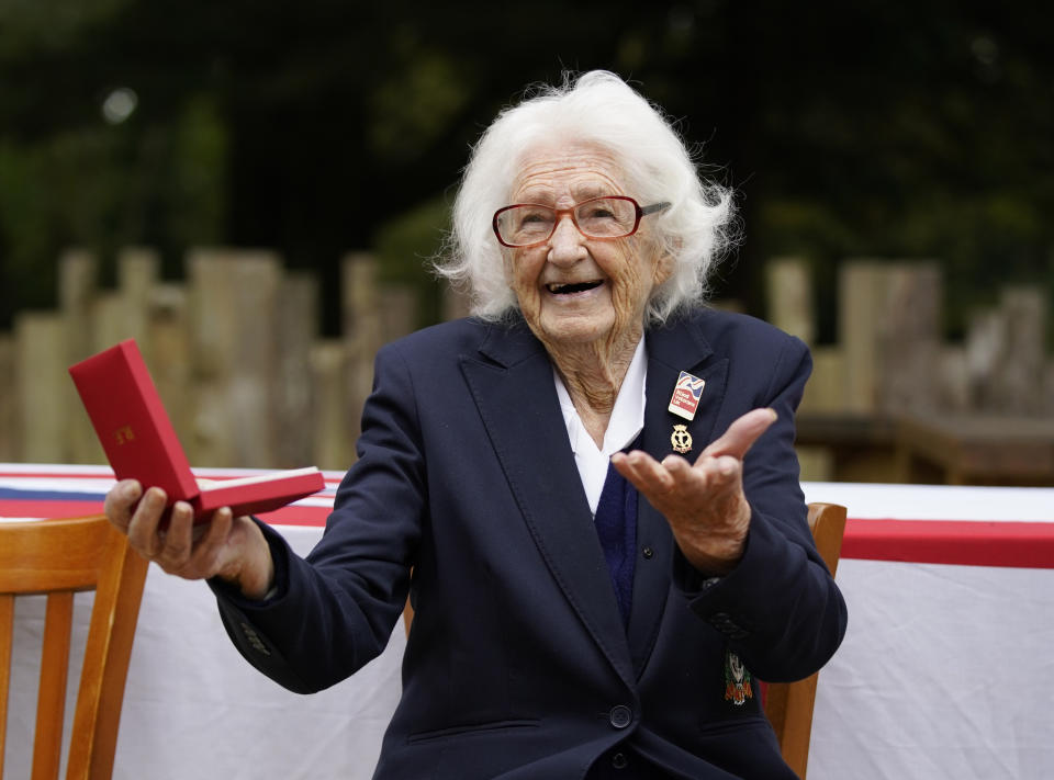 <p>WW II veteran, 96-year-old Lorna Cockayne, who served in the Women's Royal Naval Service (WRNS), popularly and officially known as the Wrens, as a Bletchley Park codebreaker, with the Legion d'honneur after receiving it during a ceremony at the Pear at Parley in Ferndown, Bournemouth from Commodore Jude Terry RN. Picture date: Friday October 8, 2021.</p>
