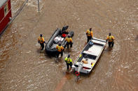 Rescuers patrol in floodwater caused by Hurricane Florence, in this aerial picture, in Lumberton, North Carolina, U.S. September 17, 2018. REUTERS/Jason Miczek