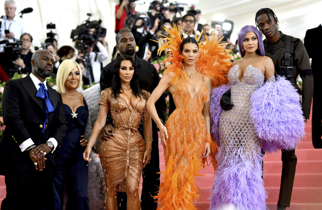 Corey Gamble, from left, Kris Jenner, Kim Kardashian, Kendall Jenner, Kylie Jenner and Travis Scott attend The Metropolitan Museum of Art's Costume Institute benefit gala celebrating the opening of the "Camp: Notes on Fashion" exhibition on Monday, May 6, 2019, in New York. (Photo by Charles Sykes/Invision/AP)