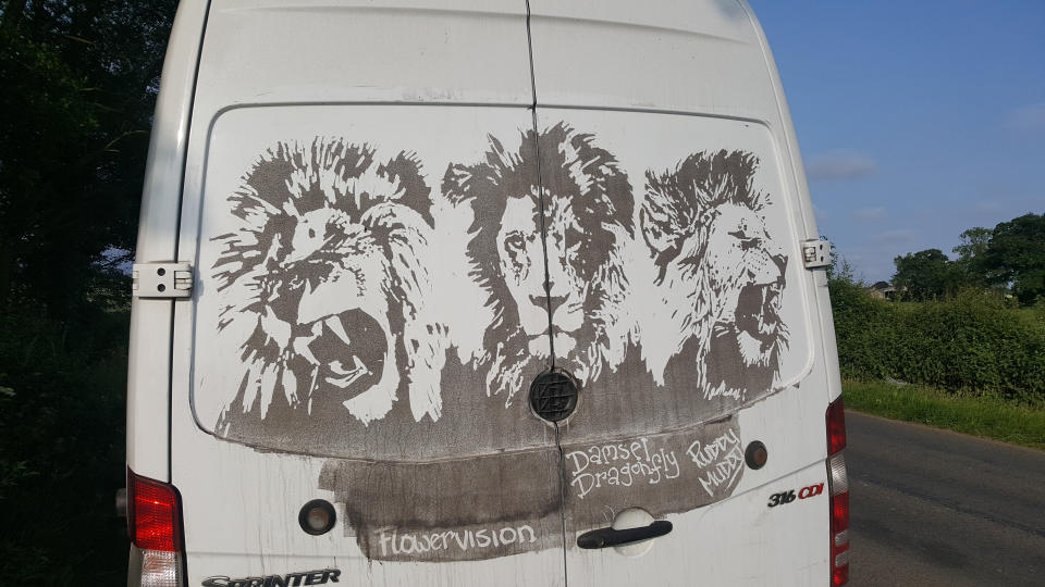 Red and white van man: An artist made this patriotic image on the back of a van in support of England. (SWNS)