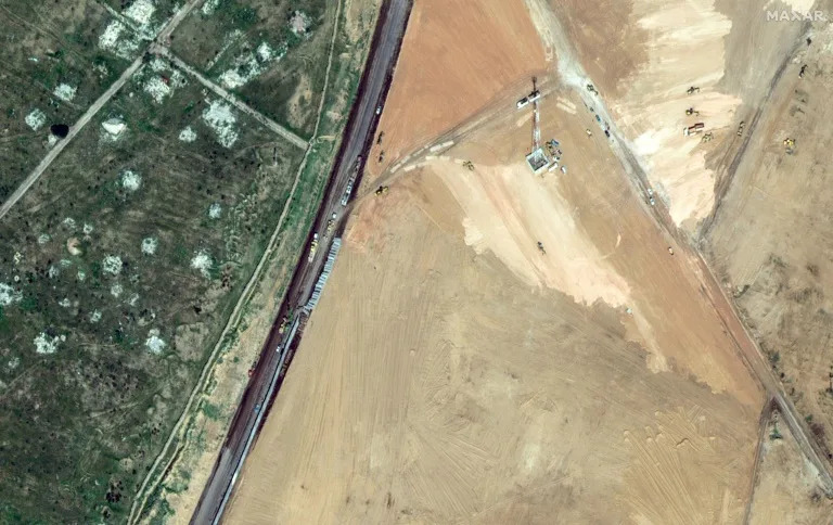 A satellite picture shows machinery building a wall along the Egypt-Gaza Strip border in Rafah, Egypt (Handout)