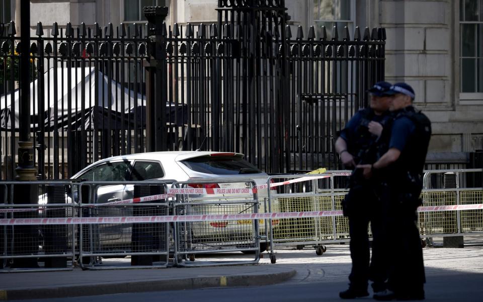 The area surrounding the car has been cordoned off by the police - HENRY NICHOLLS/REUTERS