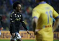 Football Soccer - Frosinone v Juventus Serie A - Matusa Stadium, Frosinone, Italy - 07/02/16. Juventus' Juan Cuadrado celebrates after scoring against Frosinone. REUTERS/Max Rossi